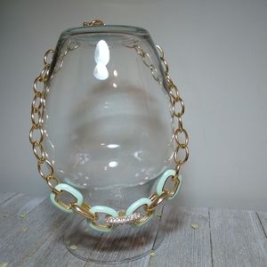 Vintage chunky gold tone necklace. Mint green with silver stones.